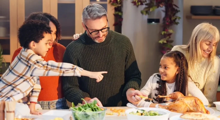 A family having dinner | Source: Shutterstock