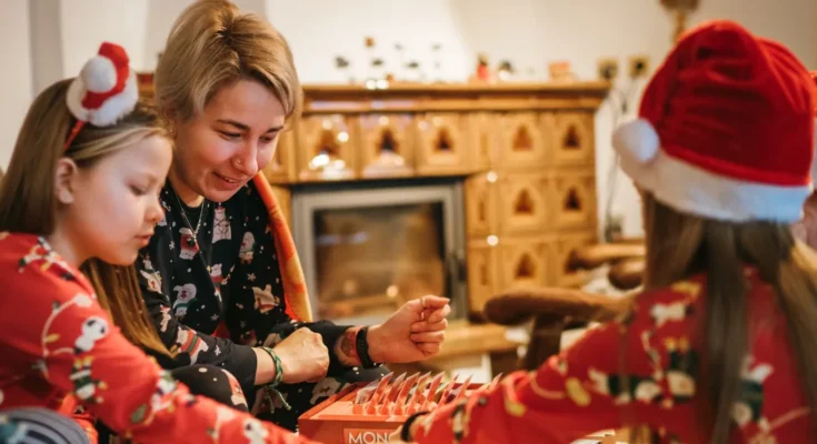 A family in Christmas pajamas | Source: Shutterstock