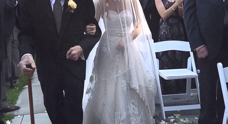 Old dad walks her daughter.