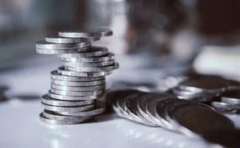 A stack of coins | Source: Freepik