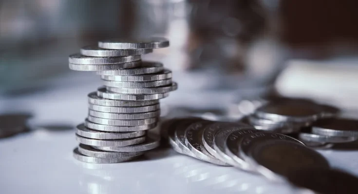 A stack of coins | Source: Freepik
