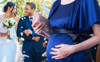 A pregnant woman at a wedding | Source: Shutterstock