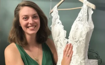 A woman holding a wedding dress | Source: AmoMama