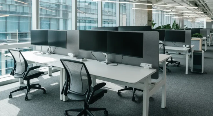 A modern office with empty workstations | Source: Shutterstock
