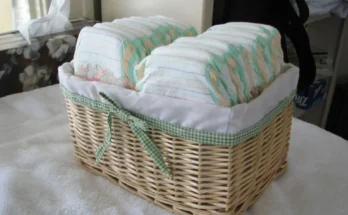 A wicker basket neatly filled with baby diapers | Source: Flickr/IngaMun/CC BY 2.0