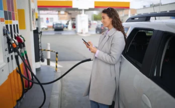 A woman at a gas station | Source: Freepik
