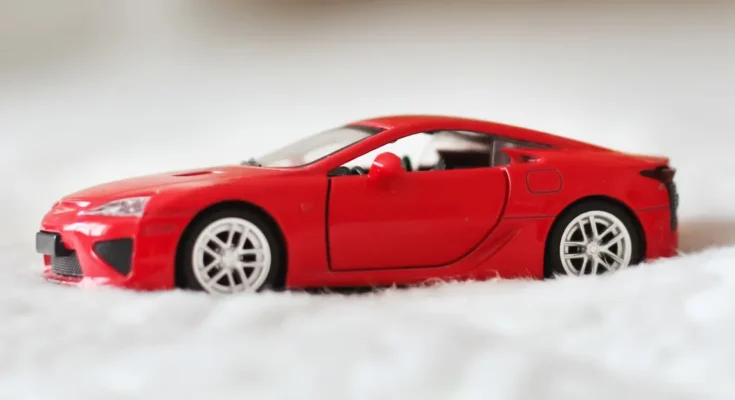 A red toy car | Source: Shutterstock