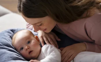 A woman tucking a child in | Source: Freepik