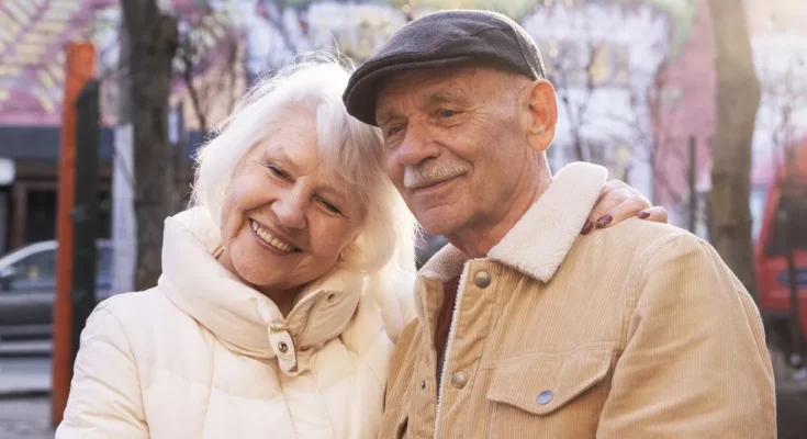 An elderly couple smiling warmly | Source: Freepik