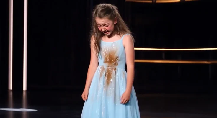 A young girl sobbing over ruined dress | Source: The Celebritist