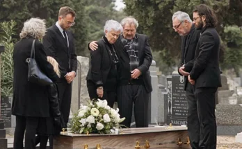 A family at a funeral | Source: Shutterstock