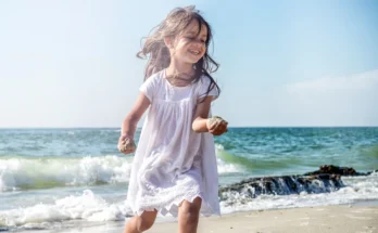 A little girl at the beach | Source: Shutterstock