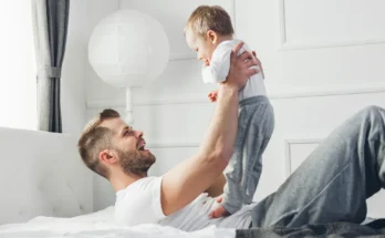 A father playing with his son | Source: Shutterstock