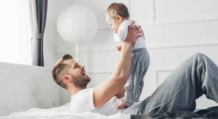 A father playing with his son | Source: Shutterstock