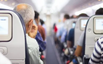 Passengers seated on a plane | Source: Shutterstock