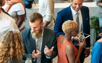 People at a corporate party | Source: Shutterstock