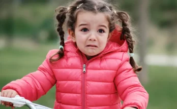 Scared girl on a bicycle | Source: Getty Images