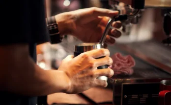 Barista preparing coffee | Source: Shutterstock