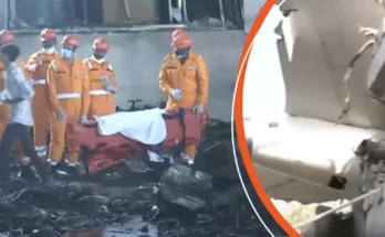 Rescue workers recover bodies from the crash site | Part of the aircraft embedded in the building exterior | Source: YouTube/ABCNews