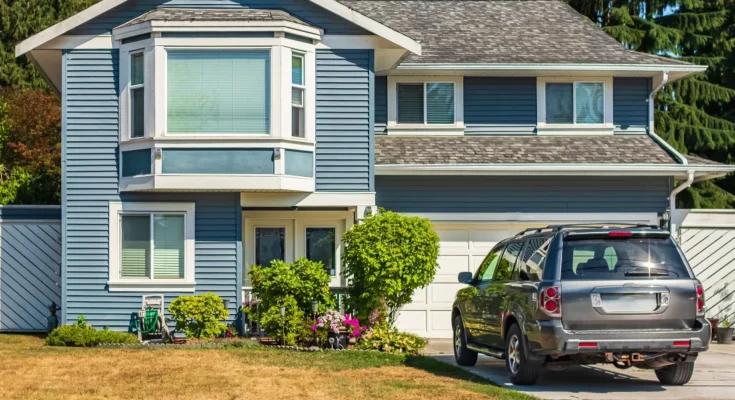 A car outside a house | Source: Shutterstock