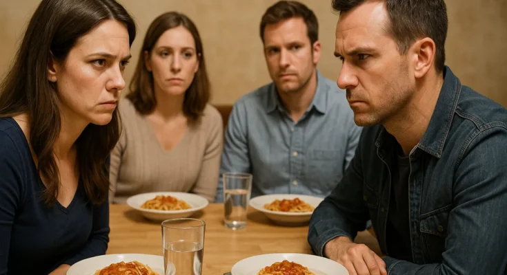 Two women and two men at a dinner | Source: Sora