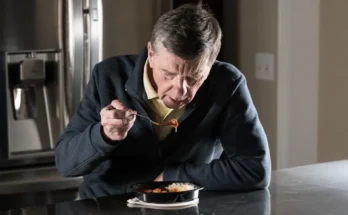 A man eating at home | Source: Shutterstock