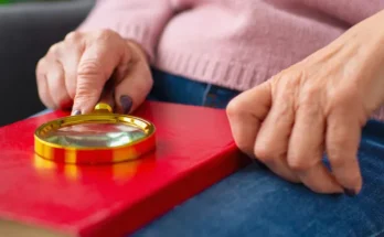 A woman with a magnifier | Source: Freepik