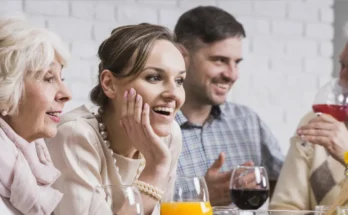 A family gathering, filled with laughter, drinks, and warm conversation | Source: Shutterstock