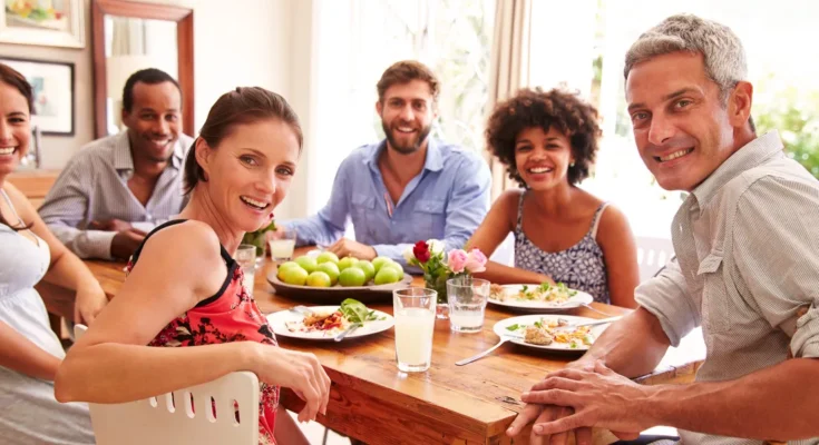 People sitting around a table | Source: Shutterstock
