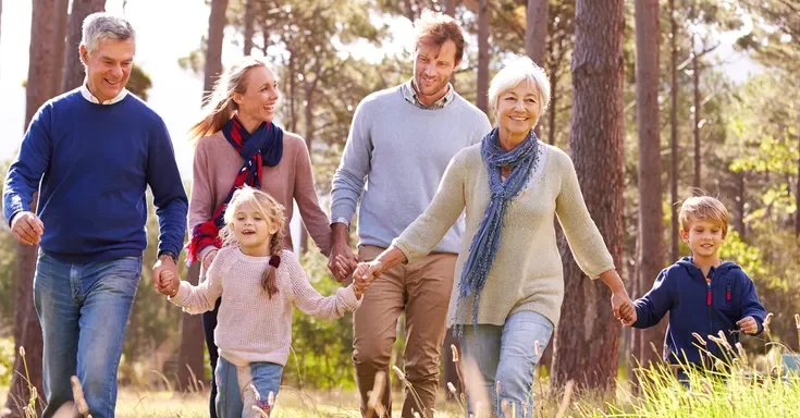 A family walking outdoors | Source: Shutterstock