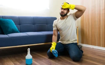 A man cleaning the floor | Source: Shutterstock