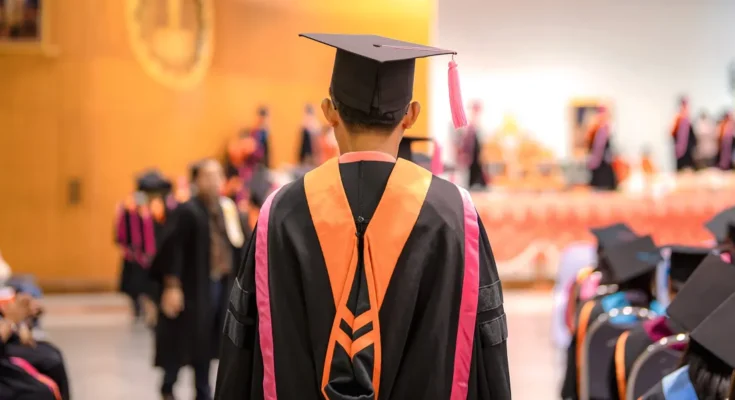 College students at a graduation ceremony | Source: Shutterstock