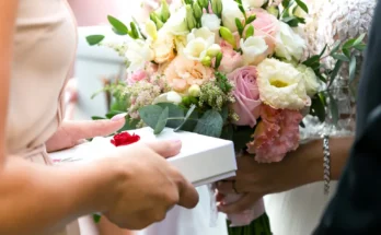 A person giving a bride a gift | Source: Shutterstock