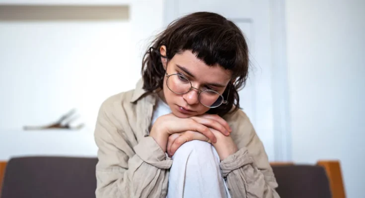 A melancholy teen girl | Source: Shutterstock
